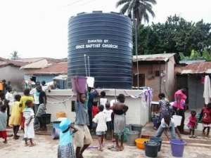 Excited Amakom children access water
