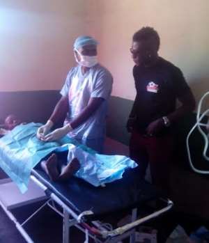 Ghana captain Asamoah Gyan performs circumcision in UNAIDS project in Malawi
