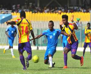 Viza Thomas of A. S Police flanked by Philip Boampong14 of Accra Hearts of Oak and Robin Gnagne27 of Accra Hearts of Oak. . During the 12th Caf Confederation's Cup 1st Preliminary Round Christian ThompsonBackpagePix