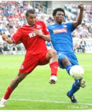 Isaac Vorsah (left) fights for control over the ball