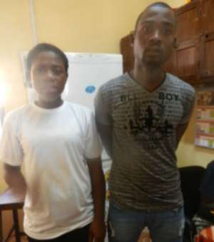 Esther Lamptey and her lover, Raymond Borteir Mensah at the Osu Police Station