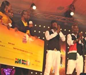The Managing Director of GGBL, Mr. Ekwunife Okoli 3rd left presenting the cheque for 36,000 to Wapi-Wapi Dance Crew from Kenya