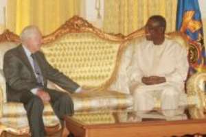 Jimmy Carter confers with President Mills