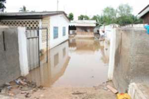 Flashback 2010: A house at Dansoman filled with water after the rains. Pix by Eric Owiredu