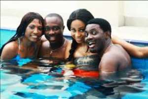 AY, Julius Agwu And Their Wives In Swimming Contest