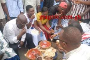 Nana Akufo-Addo (3rd Right) Flagbearer Of NPP Eating With Some Members Of Chorkor During His Listening Campaigns In Accra