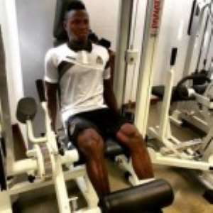 Samuel Inkoom working out in the gym