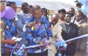 (L-R), Dr. Prince Kudolo, CEO of Lord J, holding the mic, Okoori, cutting the tape, James ahiadome being assisted by Yao Paul, and Apostle asumani Sarpong