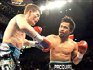 Manny Pacquiao (right) trading punches with Ricky Hatton