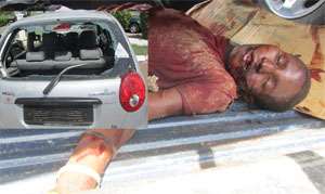 The gunned down highway robber and the car