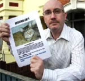 Mike Harding designed 20 posters in a last appeal to neighbours after seven-year-old Tabby cat Wookie disappeared.