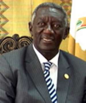 Kufuor returns home from high level meetings in Washington, DC