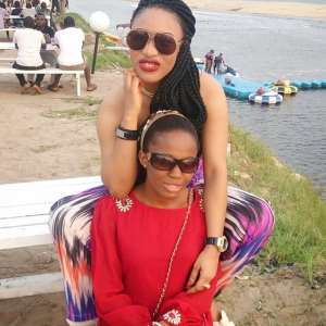 Nigerians blast Tonto Dikeh after outing with her Maid