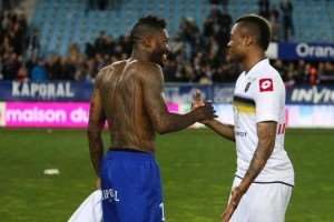 Jordan Ayew exchanges greeting with Jibril Cisse after a match for Sochaux
