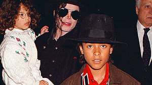 Jordy Chandler (centre) with the late Michael Jackson