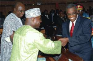 President Mills in a handshake with Mr Osei Kyei-Mensah Bonsu, the Minority Leader.
