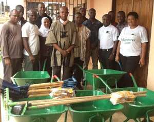Some officials of BoA and KMA pose with the items presented.