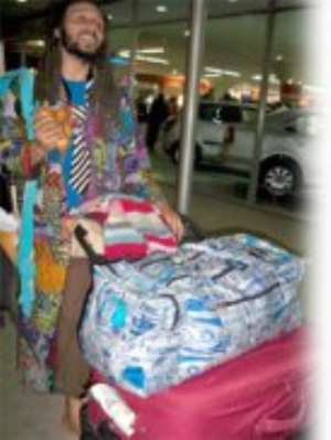 Wanlov on arrival at the Kotoka Airport last Monday night.