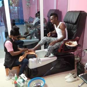 LIFESTYLE: Ghana defender Harrison Afful visits wifes Beauty Parlour