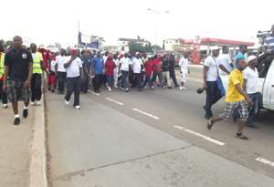 Bishop Agyin Asare leading some members of the church in the walk