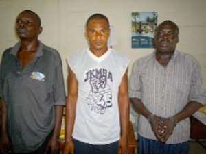 The suspects. Inset: Fake Dollars