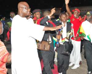 Kojo Bonsu at the Kotoka International Airport when the Satellites returned from their world conquest