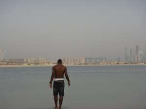 Ghana star Kwadwo Asamoah cools off at a beach before joining Juventus for pre-season