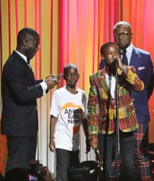 Child actor Abraham Attah on stage to receive one of the awards