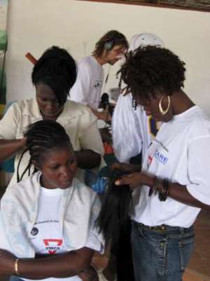 Gambia YMCA hairdressing vocational training.