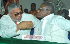President Mills listening to the former President Rawlings at the NDC congress in Tamale.