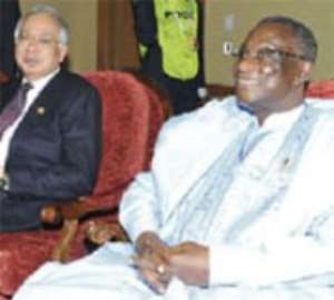President Mills with colleague, the Malaysian Prime Minister, Najib Abdul Razak, at one of the retreat sessions.