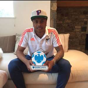 Swansea star Andre Ayew savours man-of-the-match award in Liverpool win