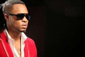Singer, Flavour Saves Fans from Fraudsters