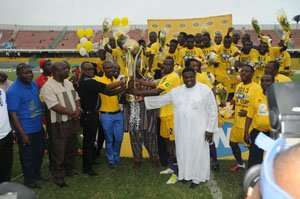 MEDEAMA FA CUP(MTN FA CUP Chairman Lepuwura MND Jawula with the trophy joined by jubilant Medeama players, GFA Veep, Fred Crentsil and Abu Sakara