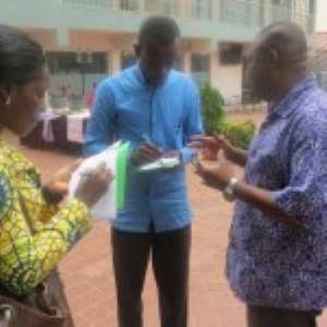 Mr Sebastian Tiah, Country Director of Oxfam being intervied by journalists during the festival