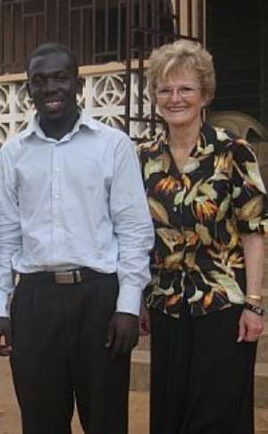 George Sarfo in Pose with the Chair of Enterpreneurship at the Seattle Unviserty Professor Harriet Stepehenson