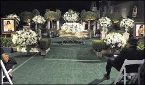 Jackos gold coffin at service