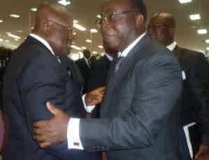Nana Addo embracing Mr. Blay after the conference