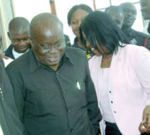Ayorkor Botchway sharing a joke with Akufo-Addo