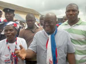 Nana Addo responmding to cheers on arrival in the region