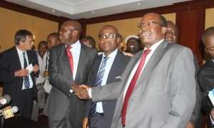 The two parties in the Kenya dispute shaking hands after Nyantakyi peace deal