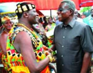 President Mills exchanging greetings with Daasebre Oti Boateng, the President of the Eastern Regional House of Chiefs during a durbar of chiefs in Koforidua.