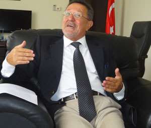 Ambassador Aydin Nurhan stressing a point during the interview