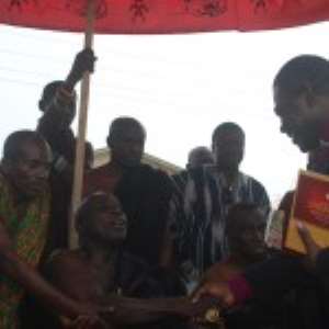 Rev.Dr Opuni in a handshake with the Okyenhene