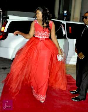 Omotola Jalade Causes Public Stare With Red Outfit Pictures