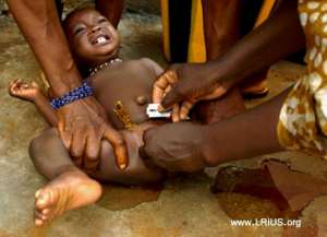 A-female-child-undergoing-the-barbaric-practice-of-Female-Genital-Mutilation