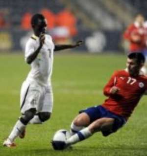 Ghana039;s Richard Mpong steals the ball from Chile039;s Gary Medel. Photo credit: AP