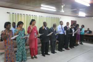 The committee members taking the oath of office