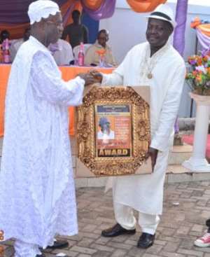 Bechem United president Kingsley Owusu-Achau receiving his award.