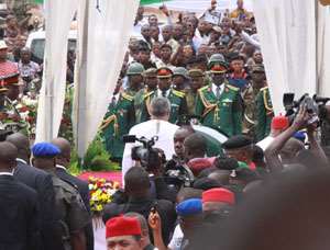 President Rawlings pays final respects to General Ojukwu